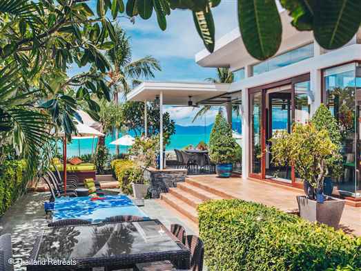<p>The Lotus Beach Villa is a stylish luxury Koh Samui villa located on a beautiful beach in a small secure beach resort with stunning views to Koh Phangan. Has it&rsquo;s own gym, a pool table, private lap pool as well as resort pool. <span style="font-size: 10pt;"><strong><span style="color: #000080;">Reduced rates for 3 or 4 bedroom occupancy with exclusive use of the villa.</span></strong></span></p>