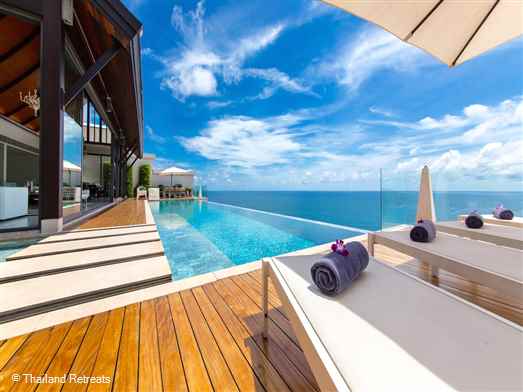 <p>Villa Paradiso is a fantastic hillside villa over looking the beautiful white sands of Nai Thon beach. Super open plan living room in contemporary black and white design. 17m swimming pool. Fitness and Games rooms. Tennis nearby.</p>