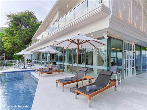 <p>Villa W Collection is a modern luxury 9 bedroom waterfront villa set 50m above and with direct access to Ao Sane beach (50m) and just 800m from the popular Nai Harn beach. Features include 3 swimming pools, 2 saunas and a fitness room</p>